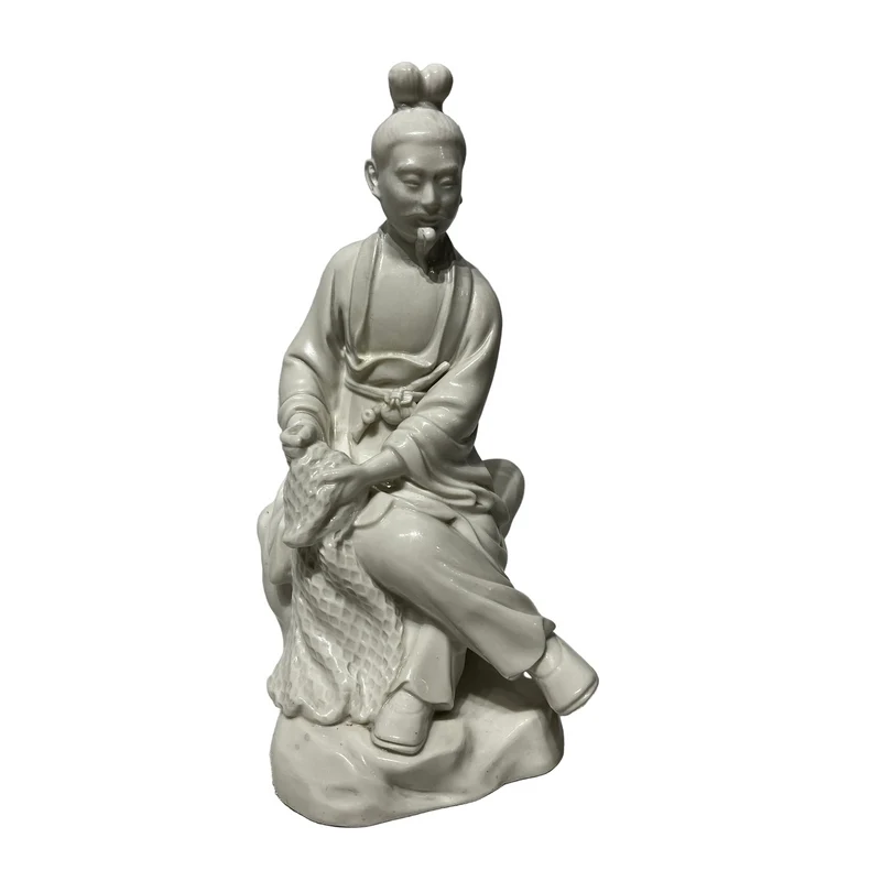 Figura de porcelana blanc de chine 'Inmortal taoísta sentado sobre roca'