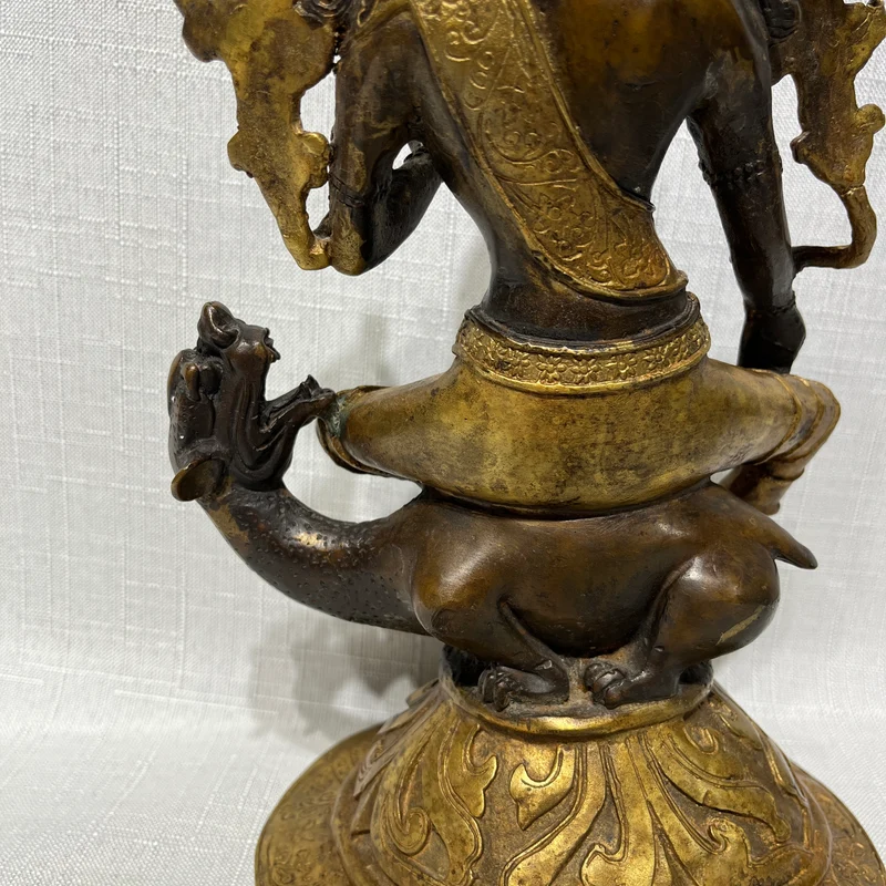 Figura tibetana de Bodhisattva Tara en bronce dorado y café fines s.XIX