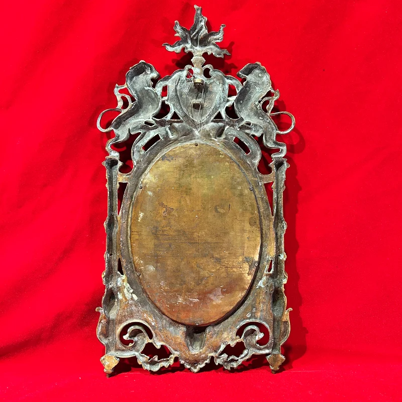 Espejo francés en bronce con decoración heráldica de leones fin s. XIX