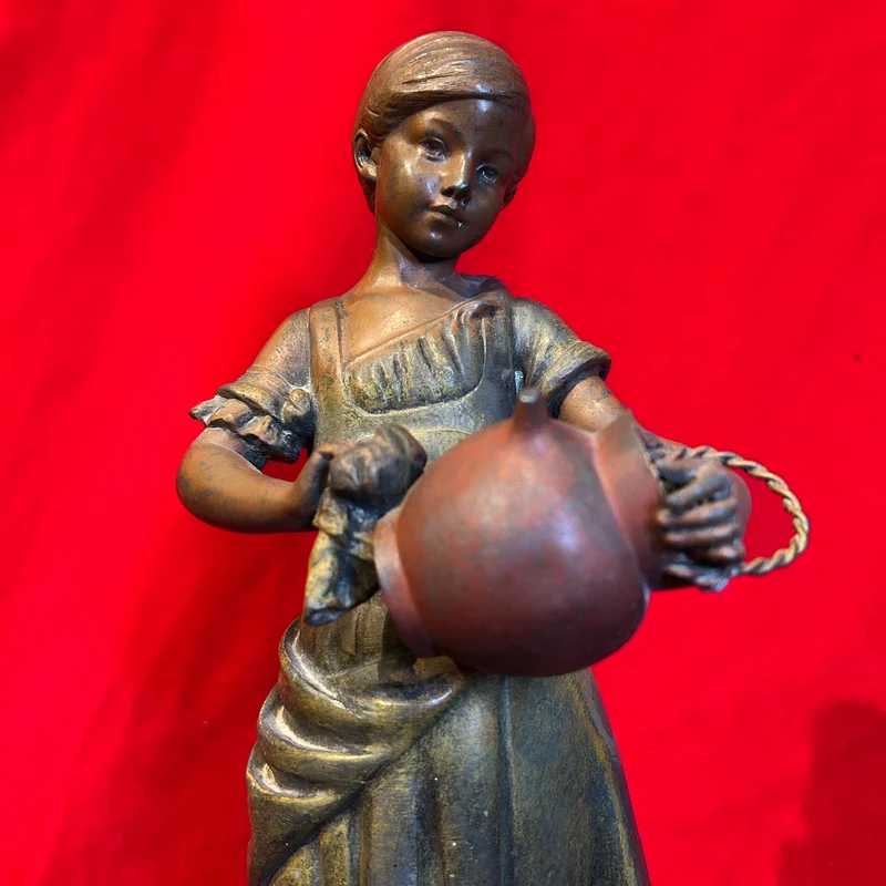Reloj borne mármol griotte con figura 'Cenicienta' en peltre según Scotte fines s. XIX