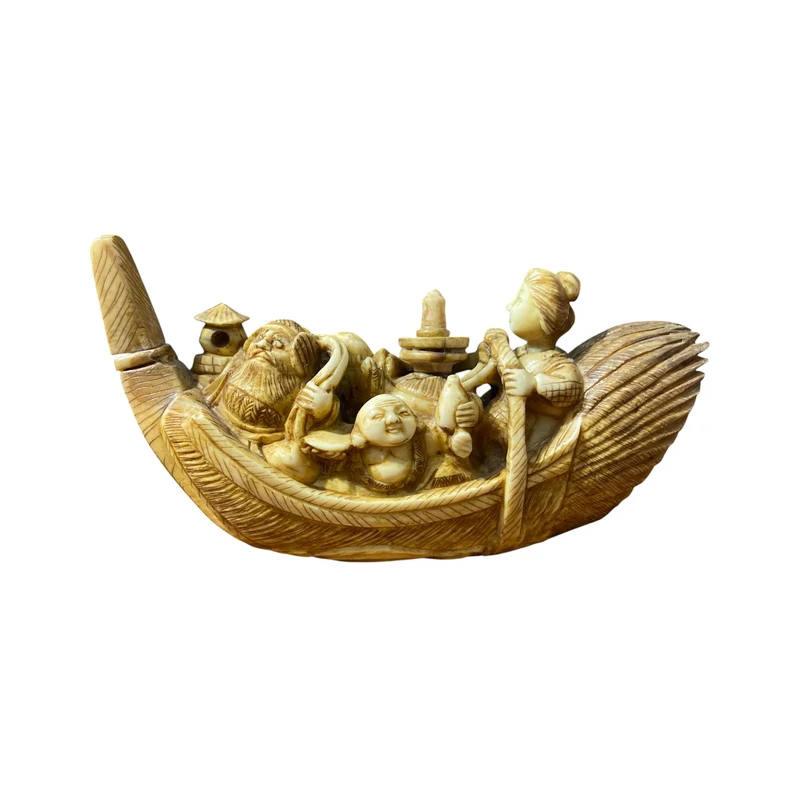 Figura netsuke de barco tallado en hueso de cachalote
