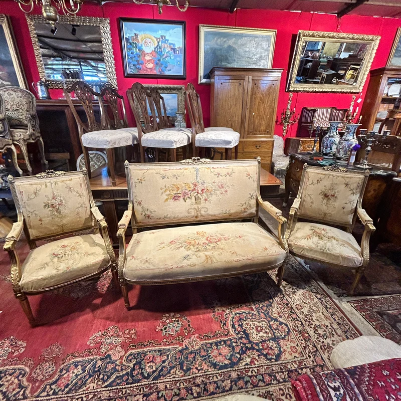 Louis XVI style living room furniture: two armchairs and sofa, petit-point upholstery