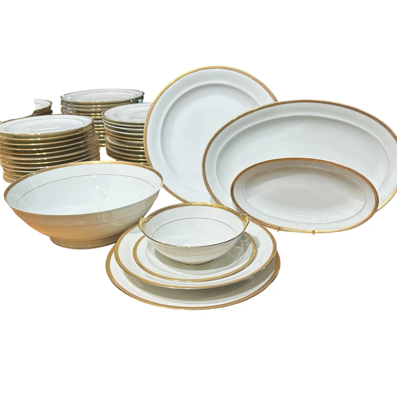 Juego de porcelana francesa Limoges con borde de oro diseño espiga para 12 personas
