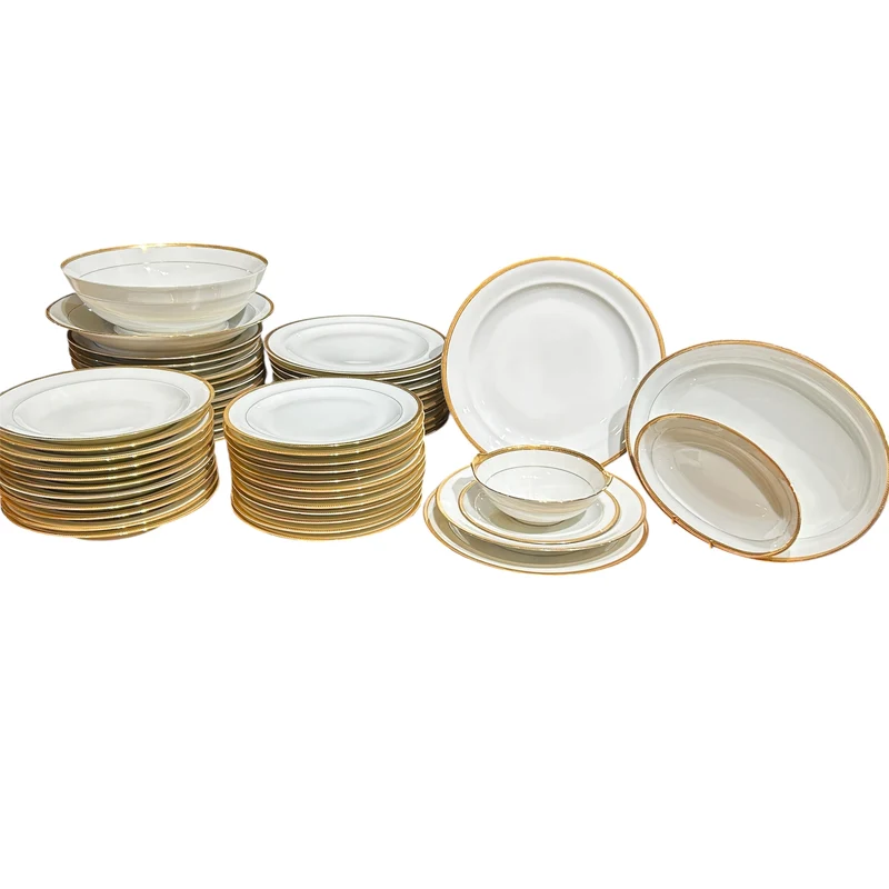 Juego de porcelana francesa Limoges con borde de oro diseño espiga para 12 personas