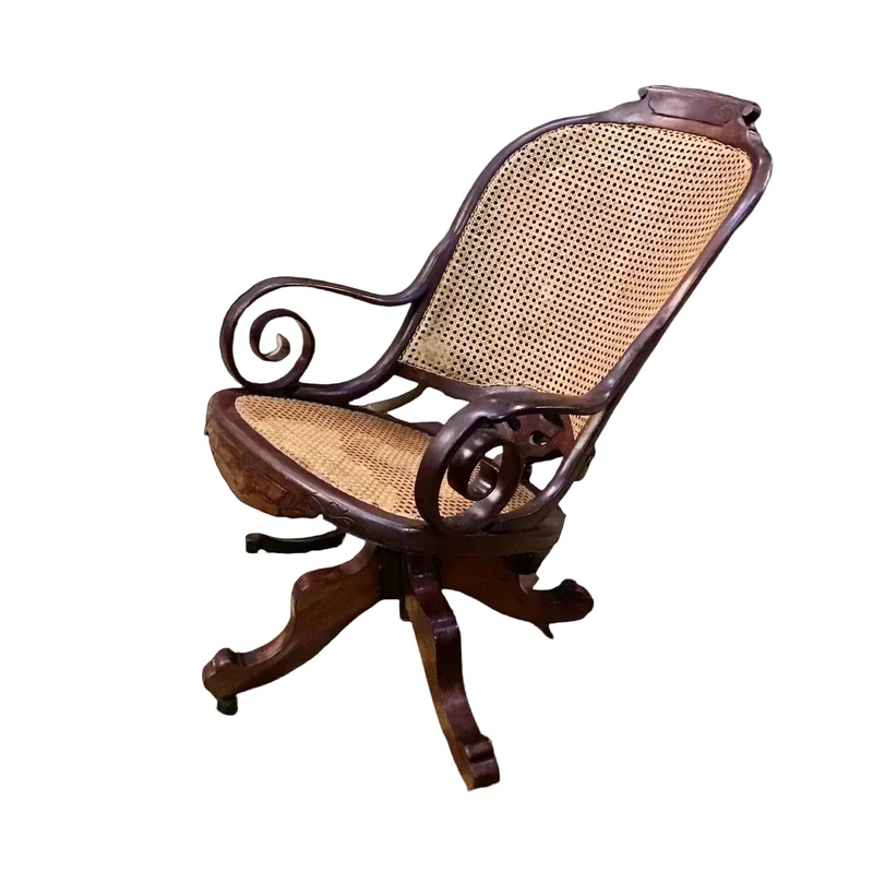 Swivel rocking chair with reeds