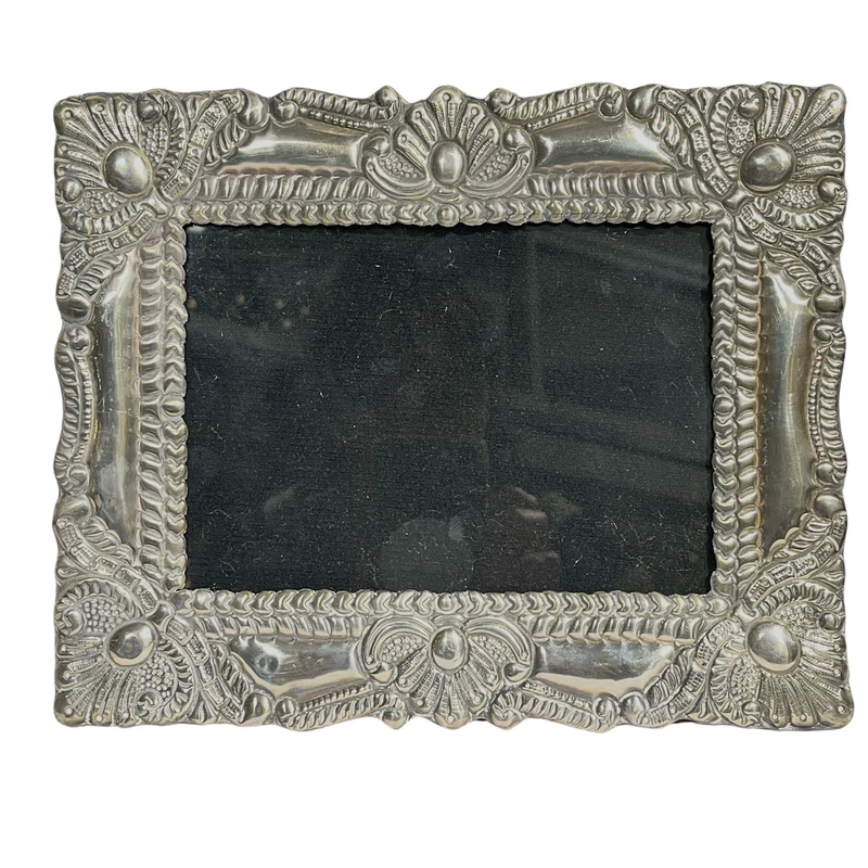 Portarretrato de madera con lámina de plata 925 repujada circa 1970