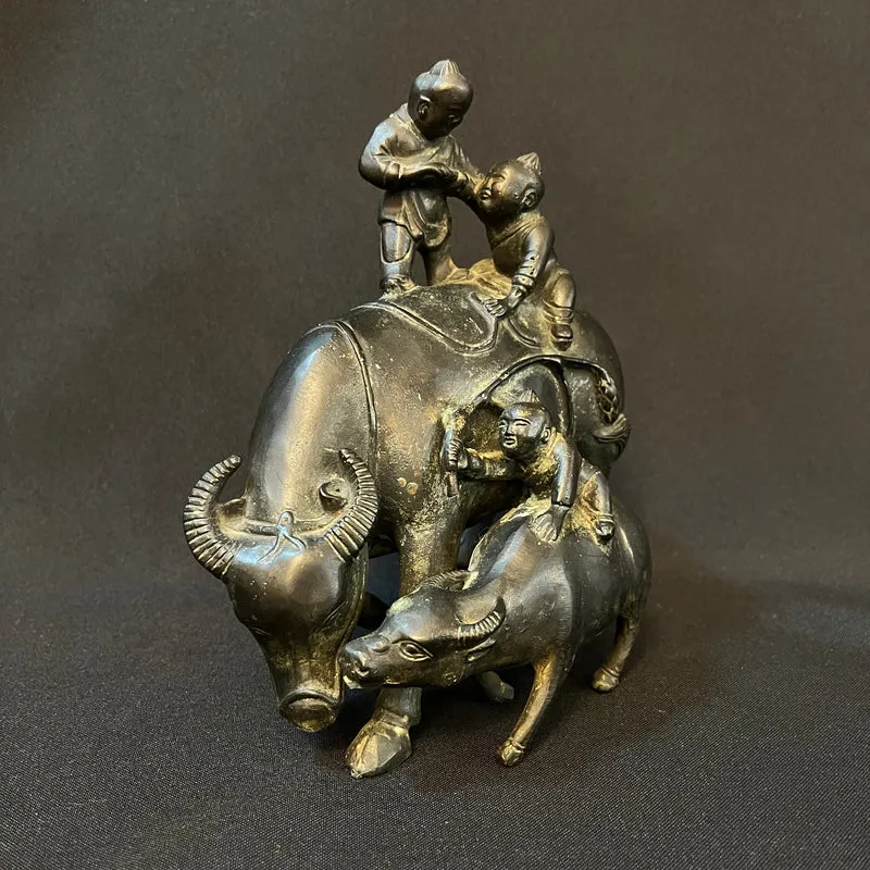 Figura china de metal niños con búfalo y ternero