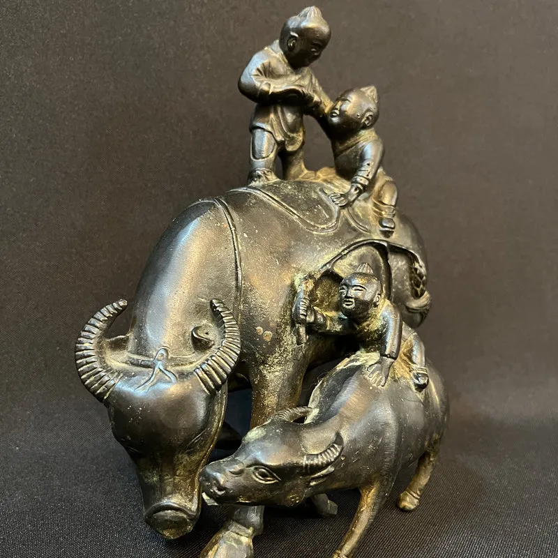 Figura china de metal niños con búfalo y ternero