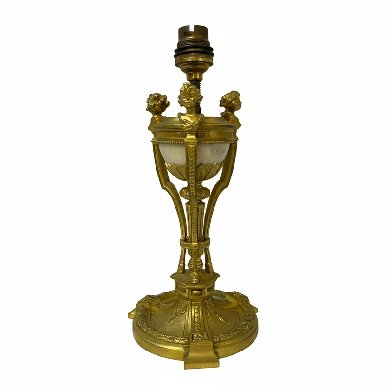 Gilt bronze lamp base and pair of black marble candlesticks, late 19th century