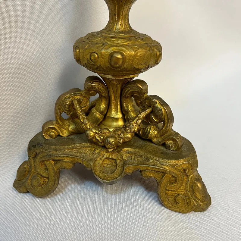 Gilt bronze lamp base and pair of black marble candlesticks, late 19th century