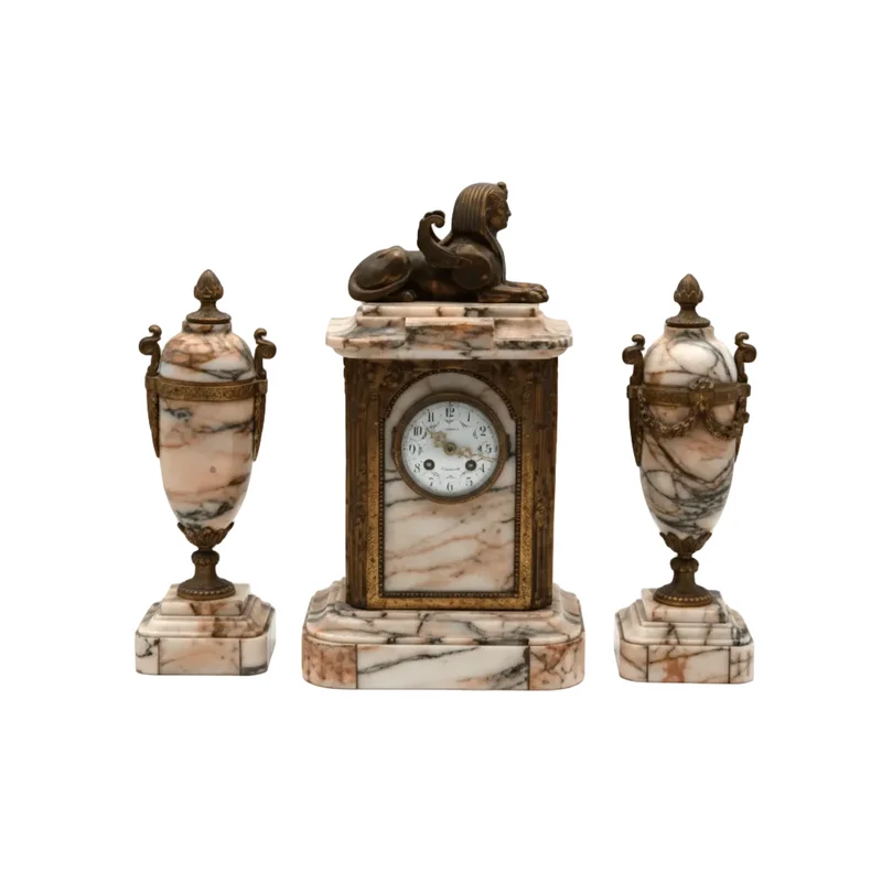 Marble fireplace clock with a Return to Egypt style mantelpiece