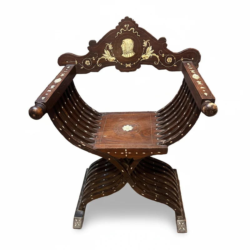 Spanish-style chair with a Savonarola head