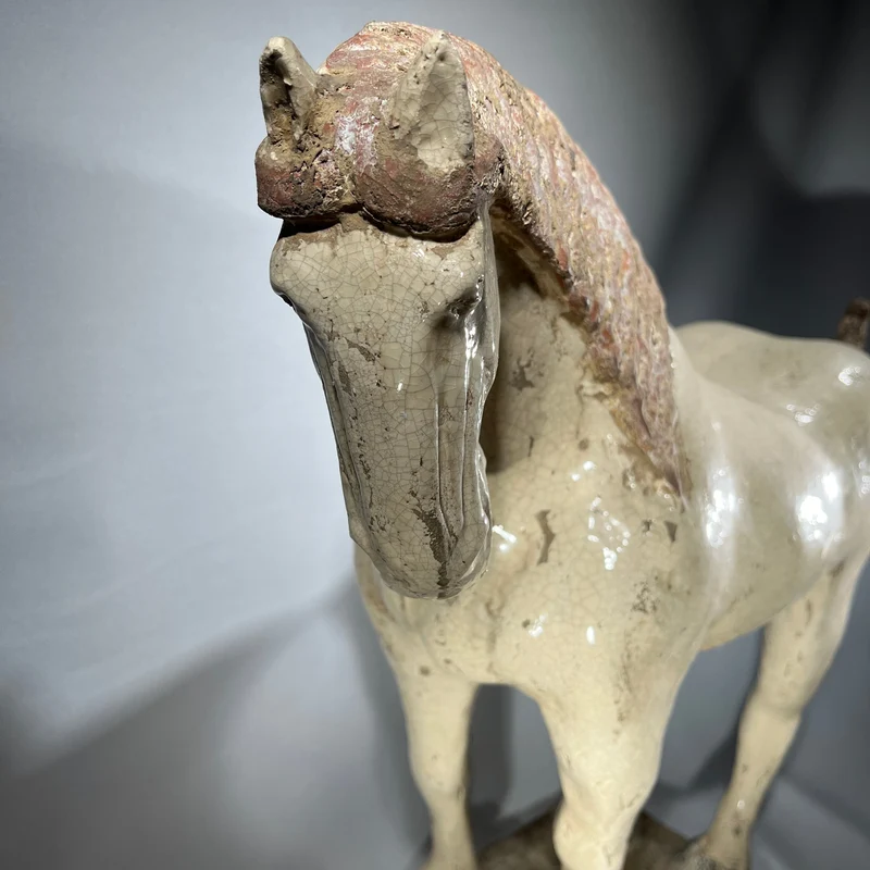Chinese Tang style horse figure in polychrome terracotta, 20th century