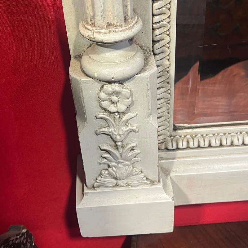Italian beveled trumeau mirror with carved wood and cupids