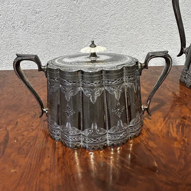Sheffield pre-Art Nouveau English silver-plated tea set with ivory insulators and silver-plated tray, 5 pieces