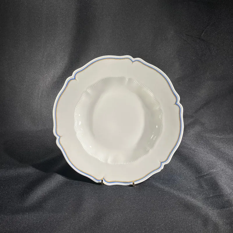 White Limoges Haviland French porcelain with blue rim and gold detail for 12 people