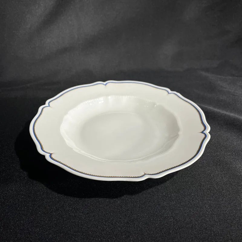 White Limoges Haviland French porcelain with blue rim and gold detail for 12 people