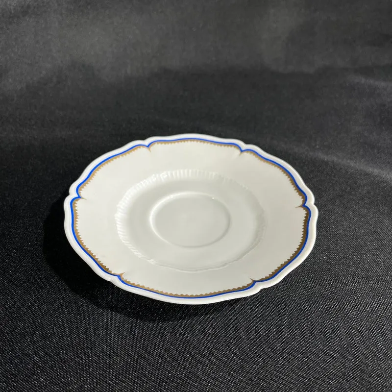 White Limoges Haviland French porcelain with blue rim and gold detail for 12 people