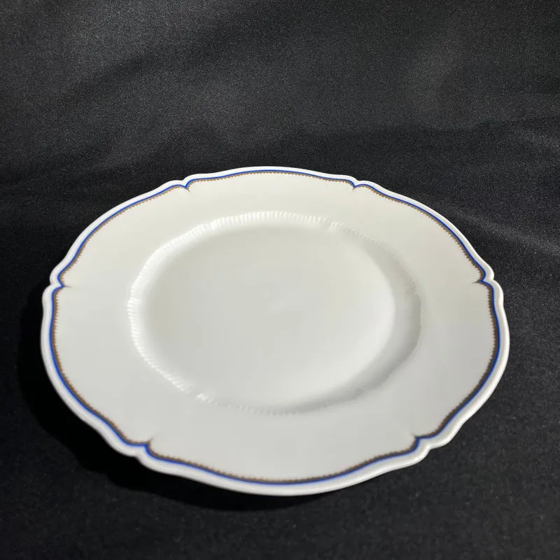 White Limoges Haviland French porcelain with blue rim and gold detail for 12 people