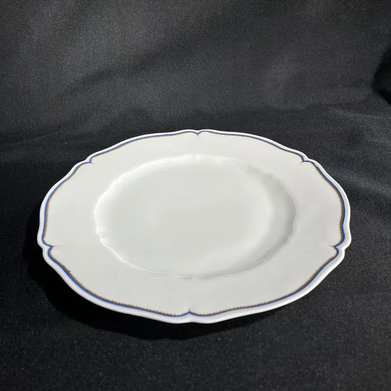 White Limoges Haviland French porcelain with blue rim and gold detail for 12 people