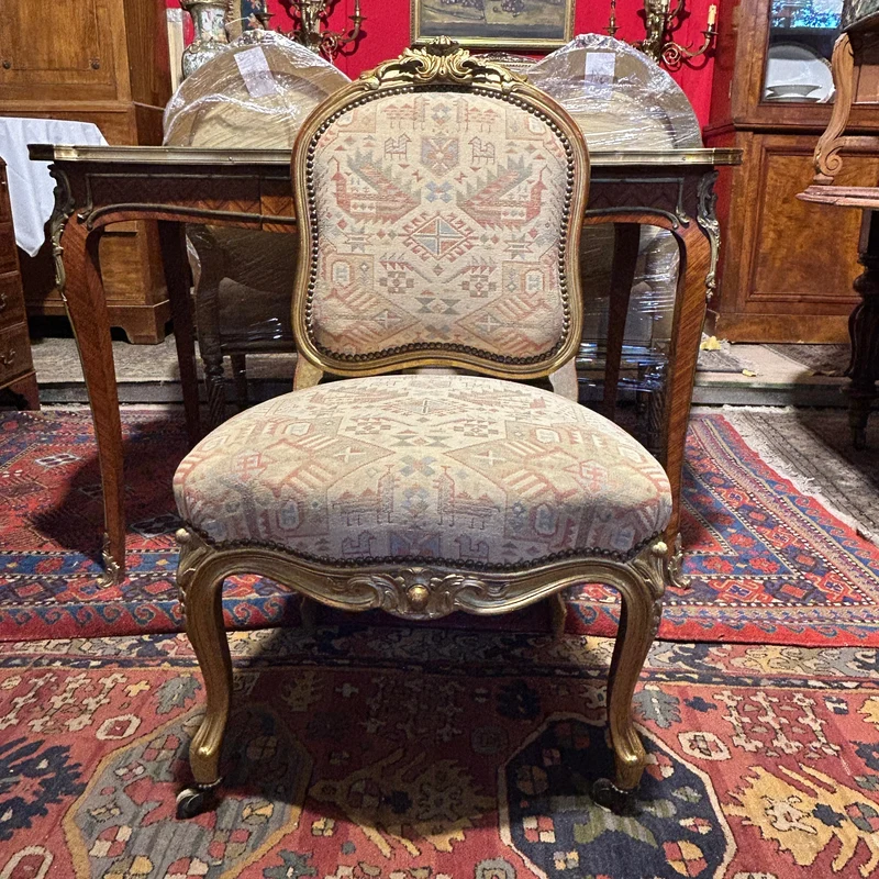 Set of four French Louis XV armchairs with original gold patina
