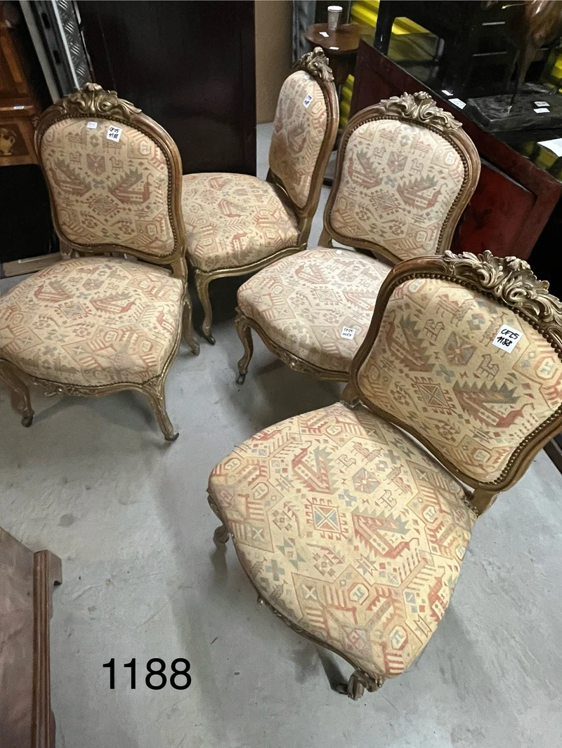 Set of four French Louis XV armchairs with original gold patina