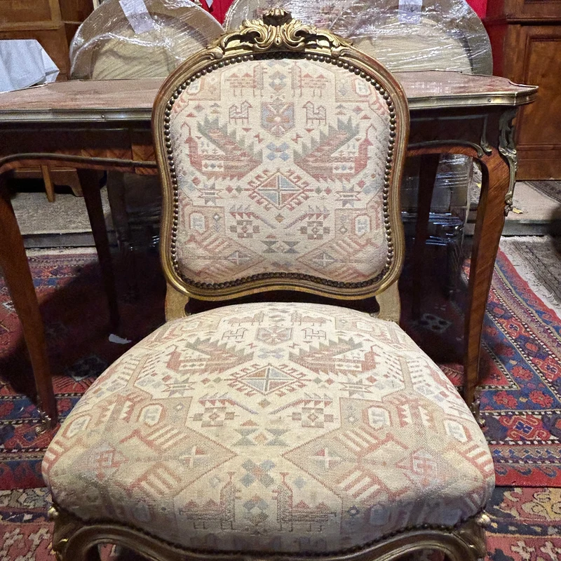 Set of four French Louis XV armchairs with original gold patina