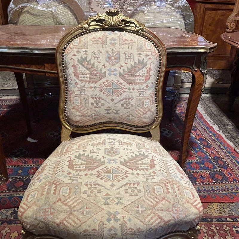 Set of four French Louis XV armchairs with original gold patina