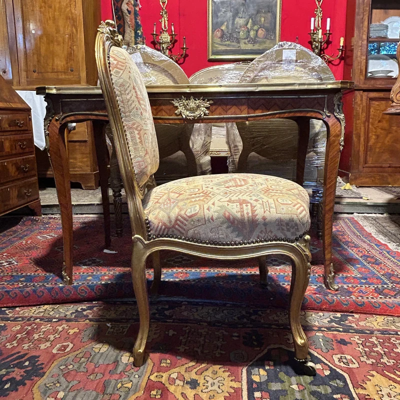 Set of four French Louis XV armchairs with original gold patina