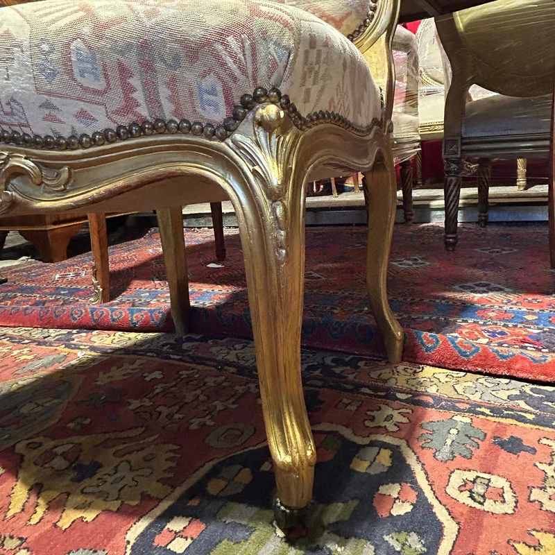Set of four French Louis XV armchairs with original gold patina