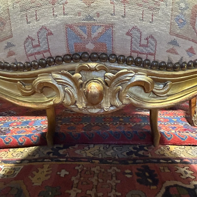 Set of four French Louis XV armchairs with original gold patina