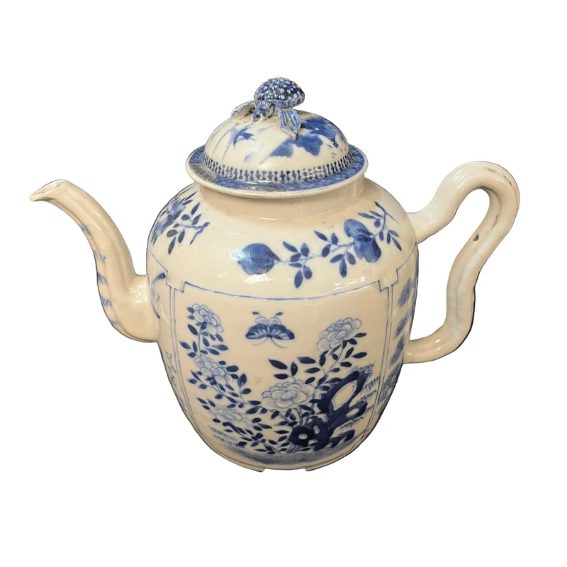Chinese porcelain teapot with hand-painted floral design