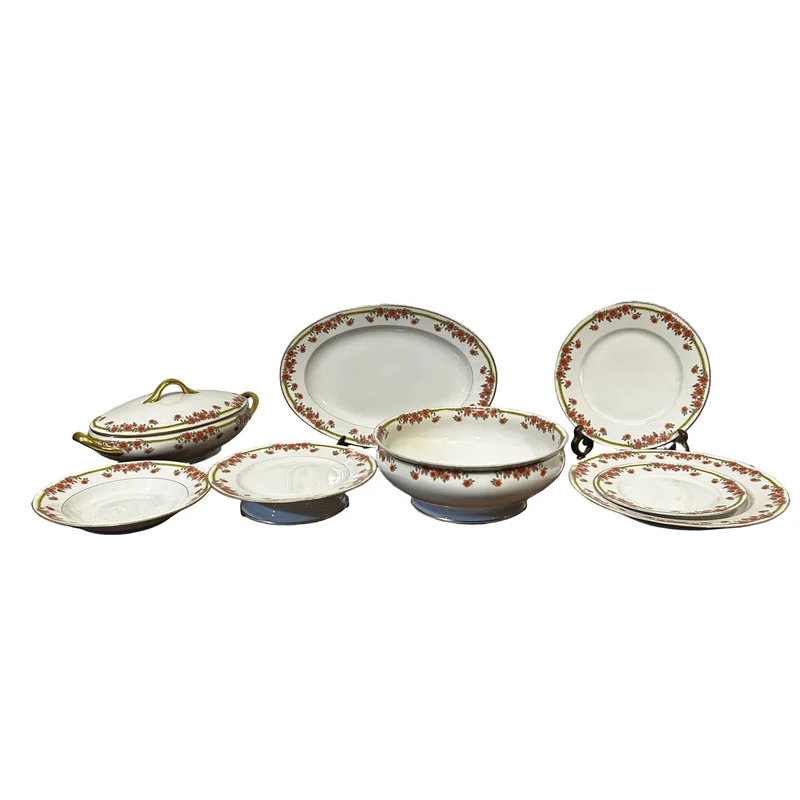 French Limoges porcelain serving set with floral decorations and gold details, 8 pieces