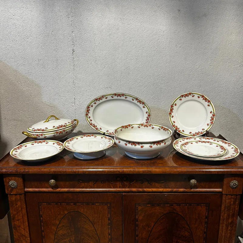 French Limoges porcelain serving set with floral decorations and gold details, 8 pieces