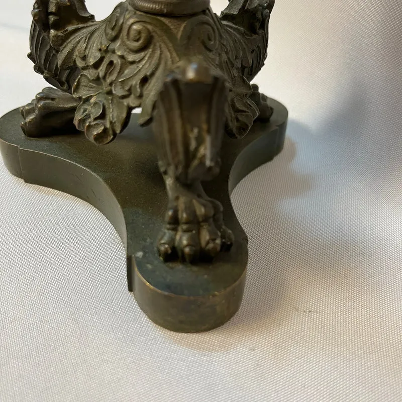 Pair of French tripod candlesticks in patinated and gilded bronze, Restoration style