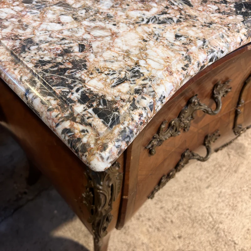 French Louis XV chest of drawers in brèche d'Alep marble marquetry