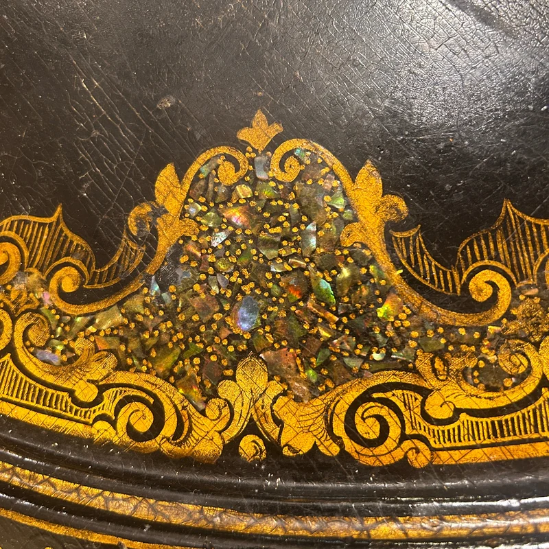 Napoleon III lacquered oval tripod gueridon with burgauté decoration and rose bouquet