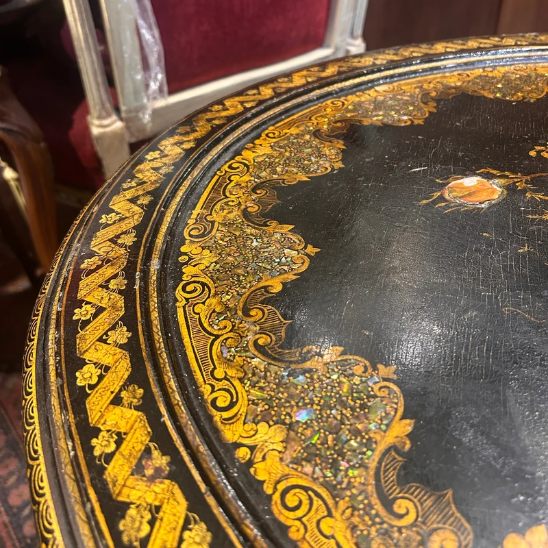 Napoleon III lacquered oval tripod gueridon with burgauté decoration and rose bouquet