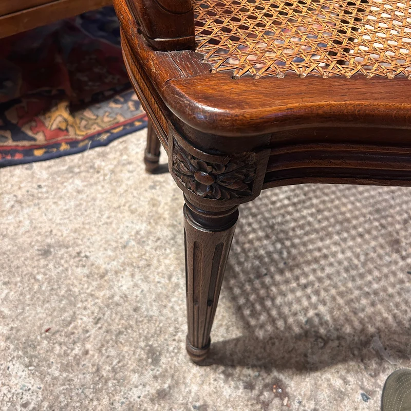 Pair of French caned armchairs in carved and molded wood, Louis XV style