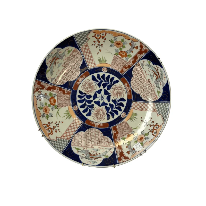 Decorative Japanese porcelain plate in the Imari style from the late 19th century.