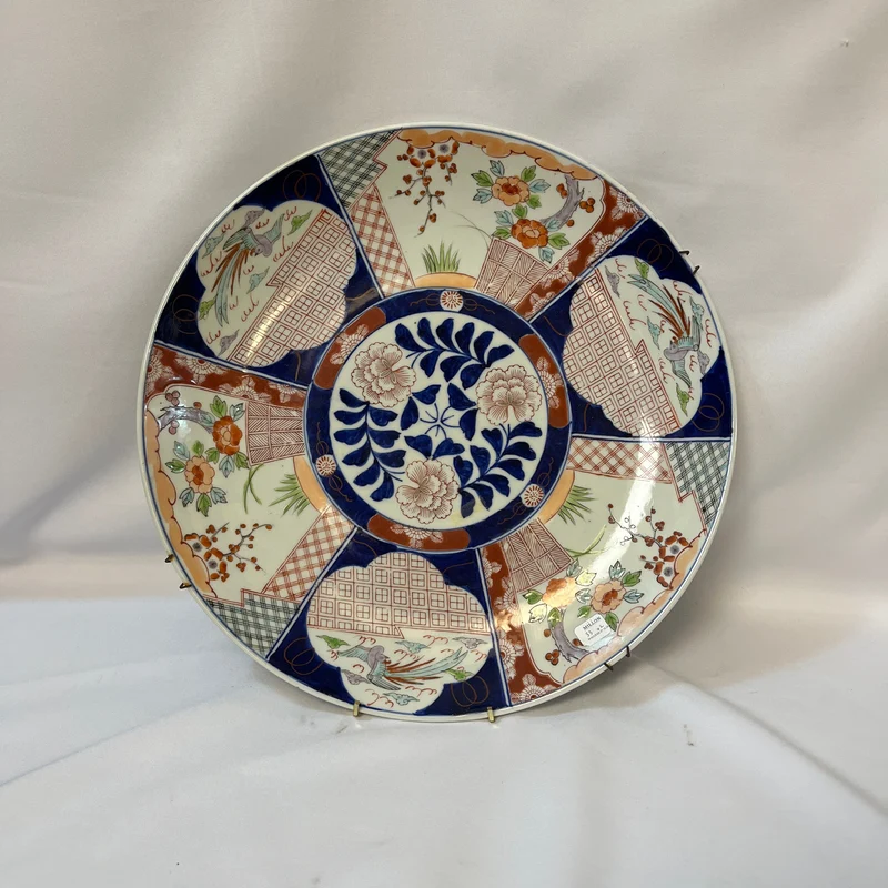 Decorative Japanese porcelain plate in the Imari style from the late 19th century.