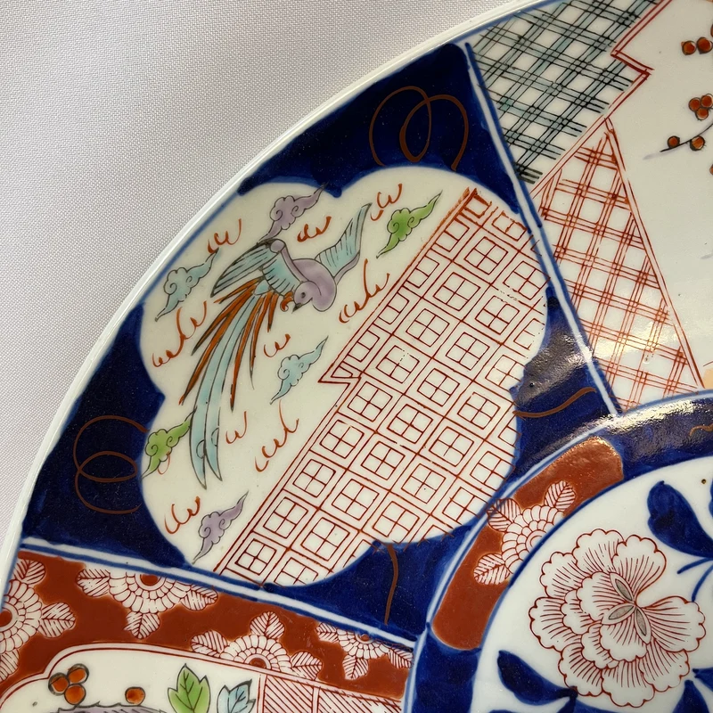 Decorative Japanese porcelain plate in the Imari style from the late 19th century.