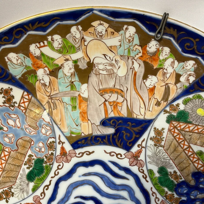 Large Japanese porcelain plate in the Imari style from the late 19th century.
