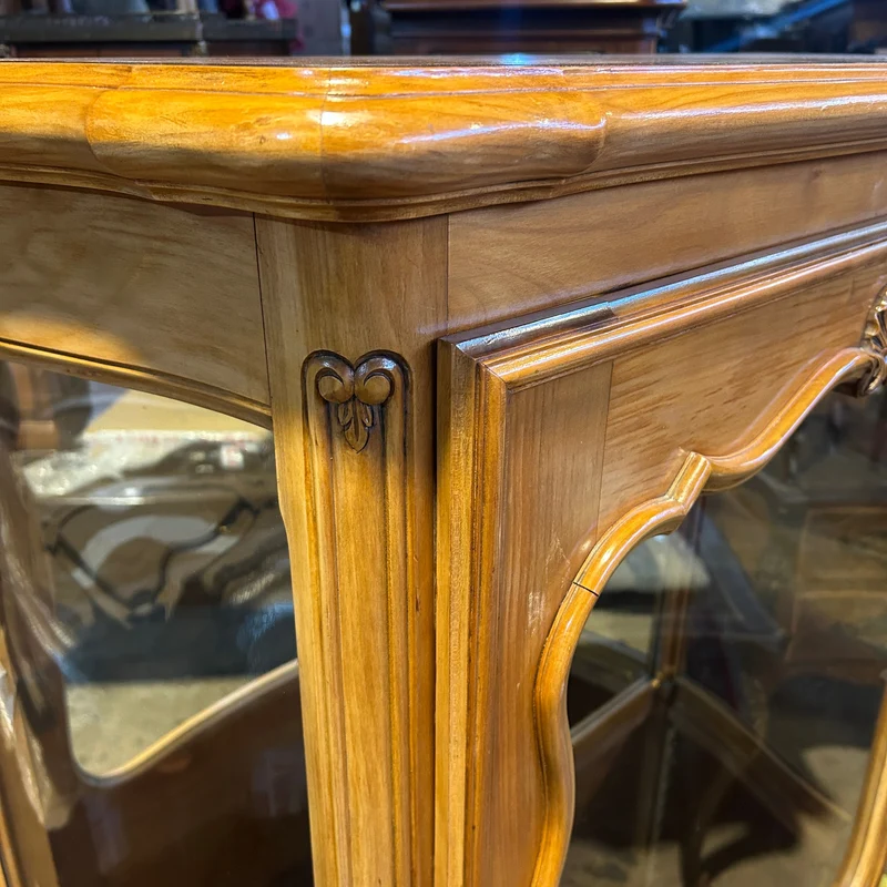 Contemporary French Louis XV bombé display cabinet with carved wood and interior mirror