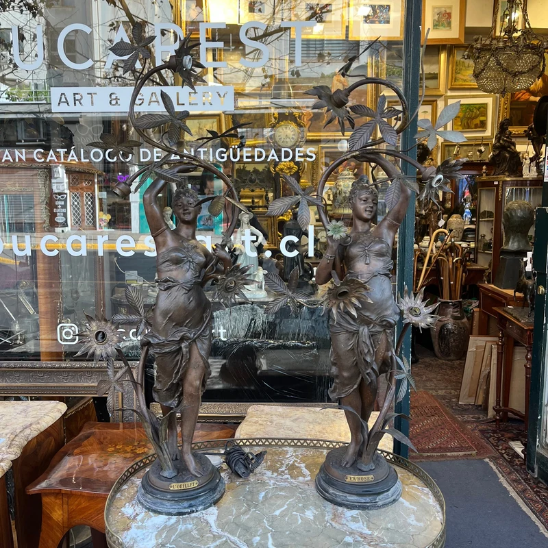 Pair of pewter lamps, two women and flowers 'La Rose, L'oeillet'