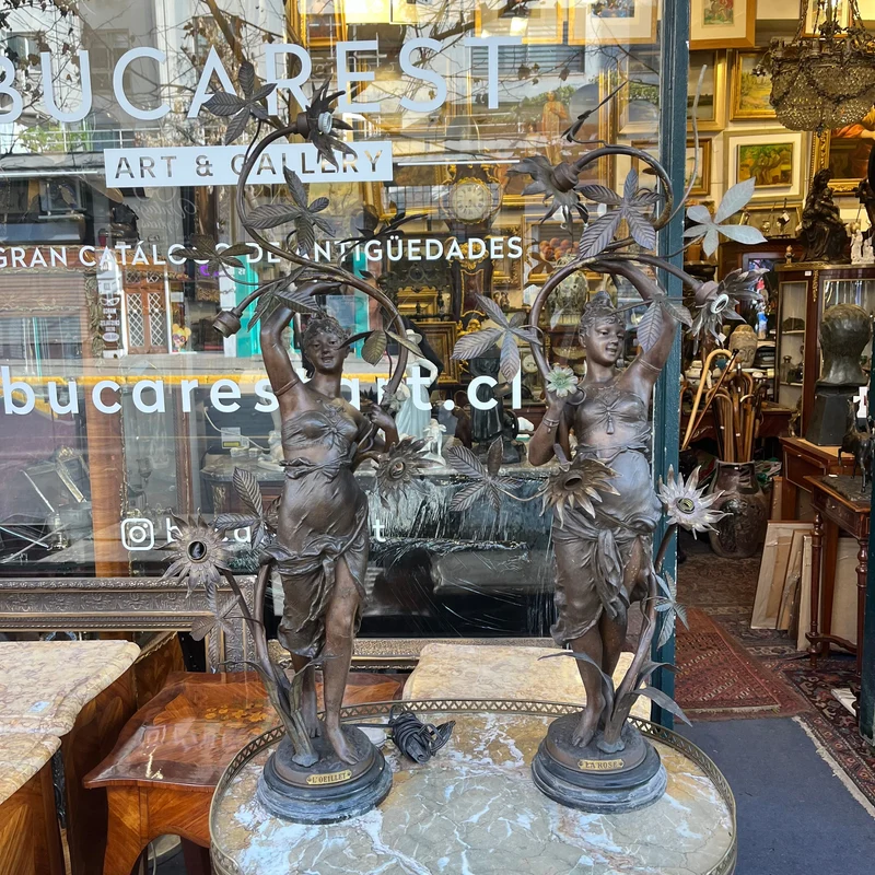 Pair of pewter lamps, two women and flowers 'La Rose, L'oeillet'