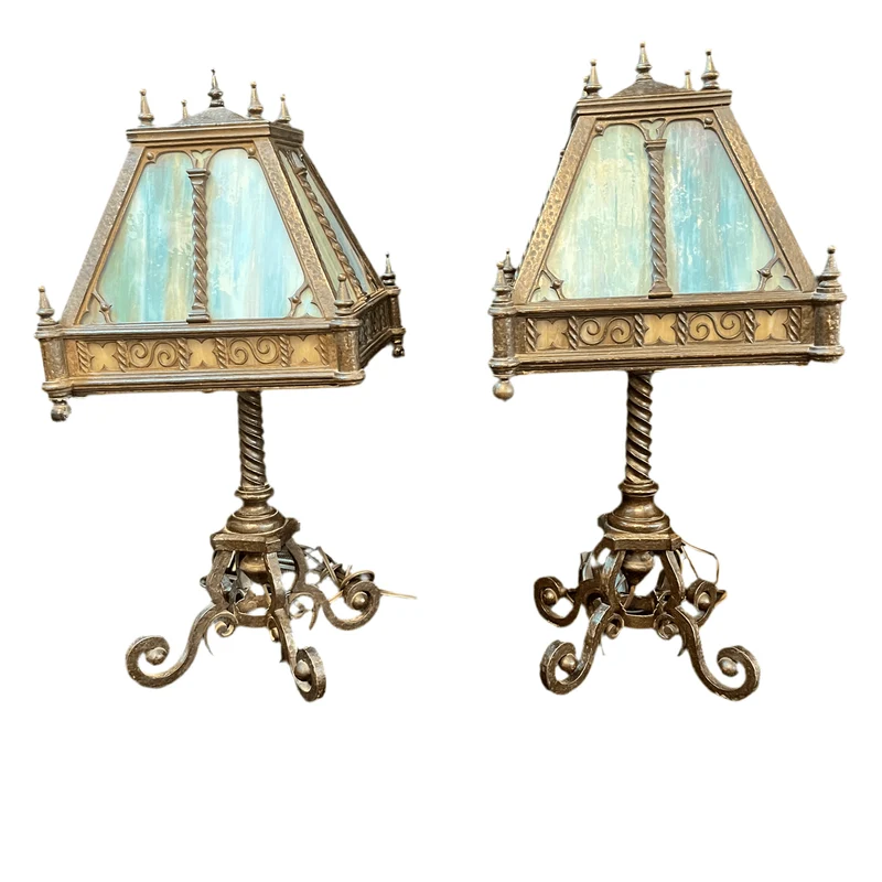 Pair of German wrought iron lamps with opal-style shades