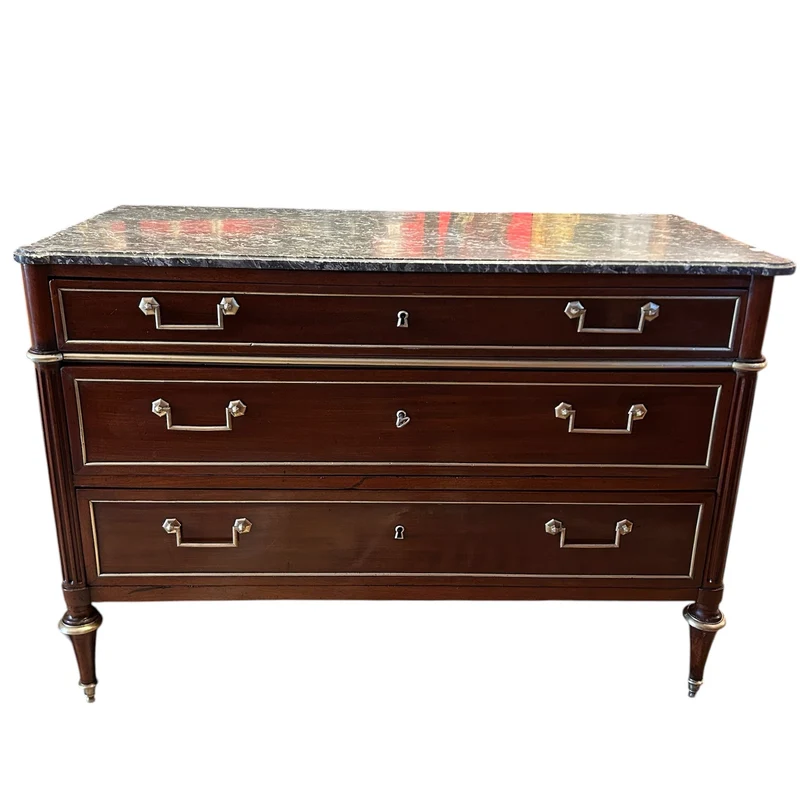 Mahogany chest of drawers with marble top in late Louis XVI style