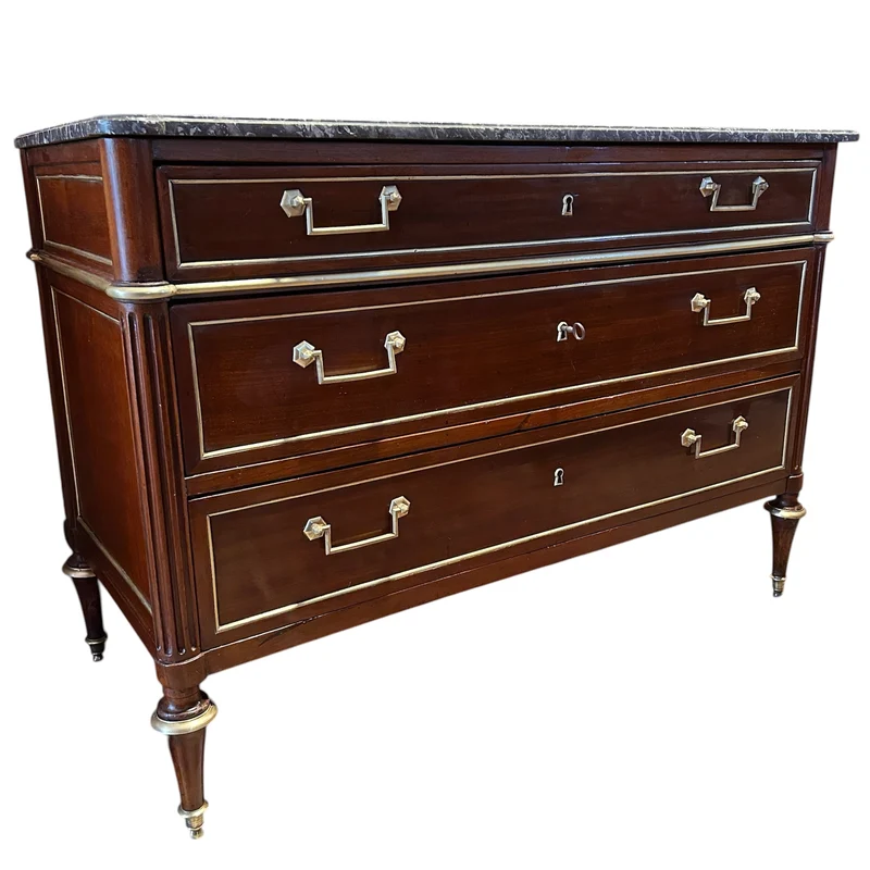 Mahogany chest of drawers with marble top in late Louis XVI style