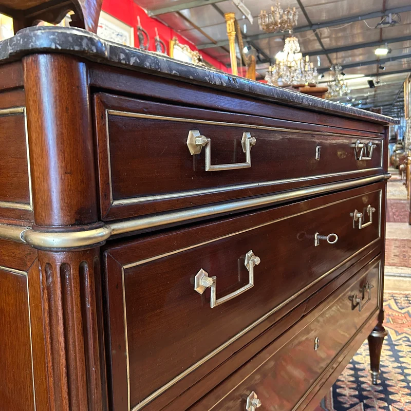 Mahogany chest of drawers with marble top in late Louis XVI style